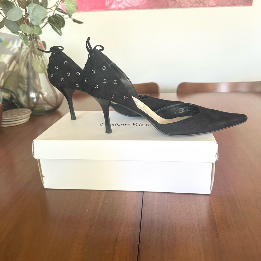 Calvin Klein corset inspired stilettos with grommet detail. Black size 9 suede.